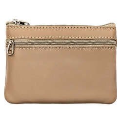 Skórzana kluczówka w beżowym kolorze zamykana suwakiem